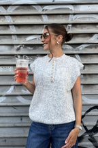 Pull sans manche bouton coeur gris