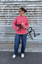 Gilet rayé rouge et rose